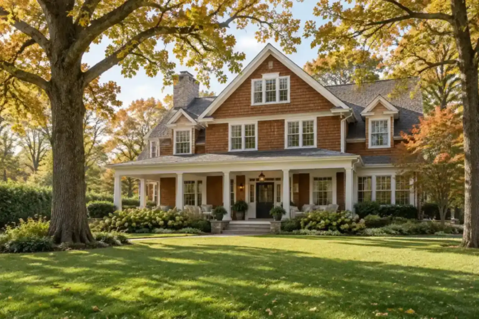 Shingle-style home with a wide porch, one of the home types in the Lake Forest, IL housing market